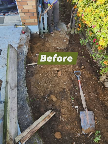 Finished landscaping with stone and planting